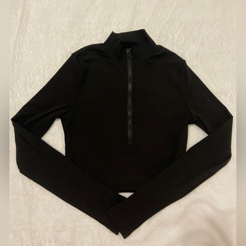 black cropped half zip black tight fit shirt